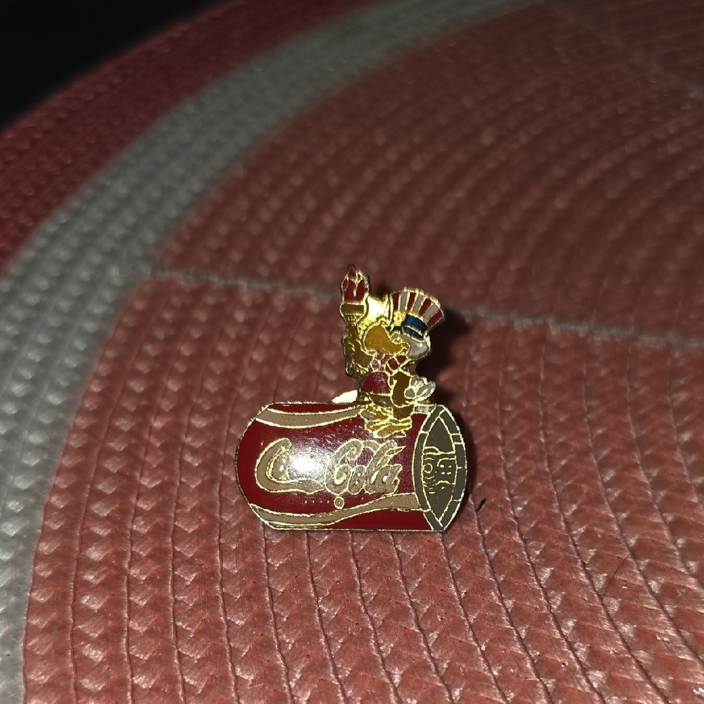 Vintage Coca-Cola Red and Gold Character Pin. 1984 Olympics Pin